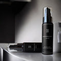 GROOMOLOGY® Argan & Macadamia Elixir for beard care, featuring sleek packaging on a shelf.